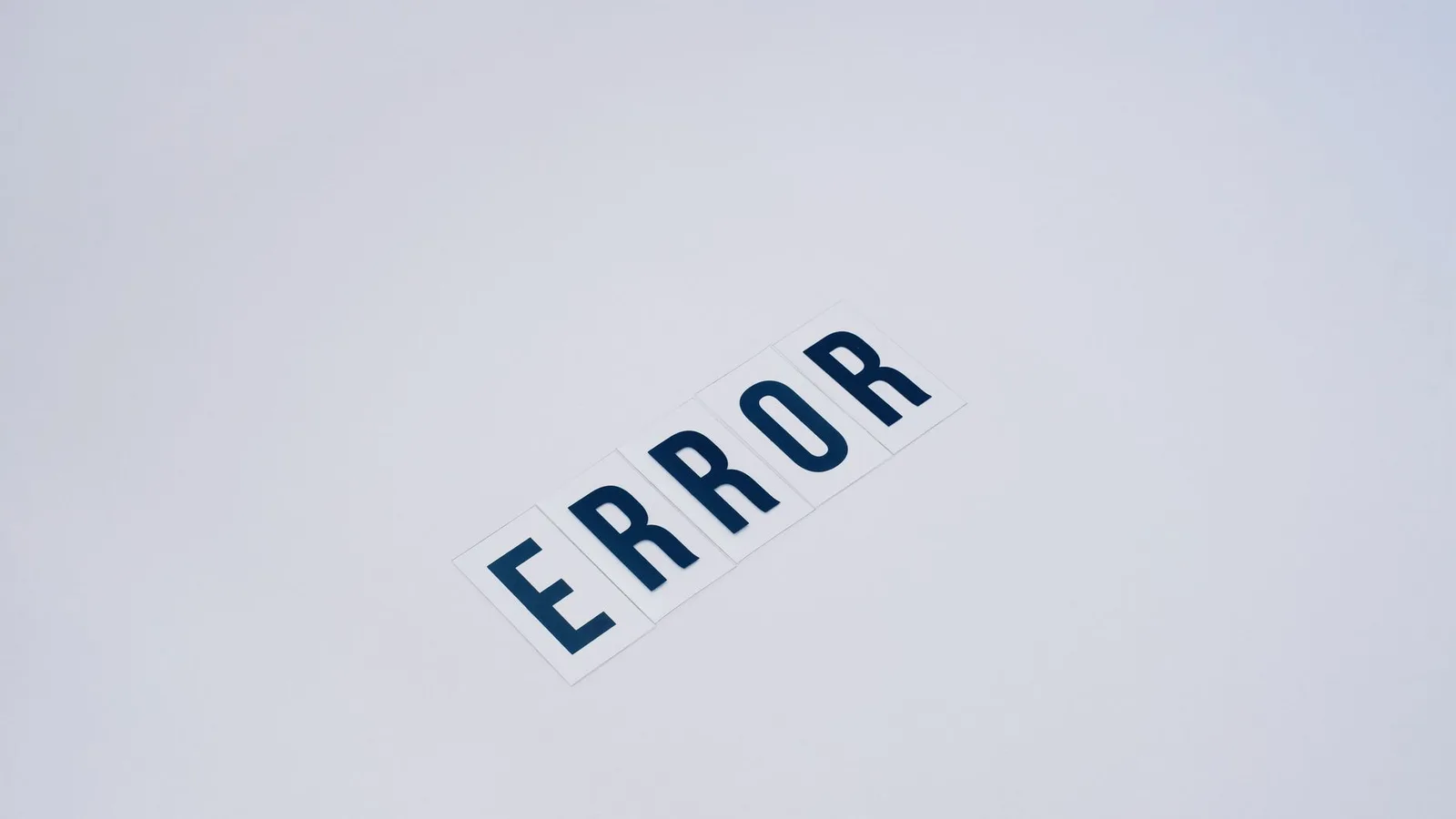 Simple and minimalist image showcasing the word 'ERROR' on a white background.